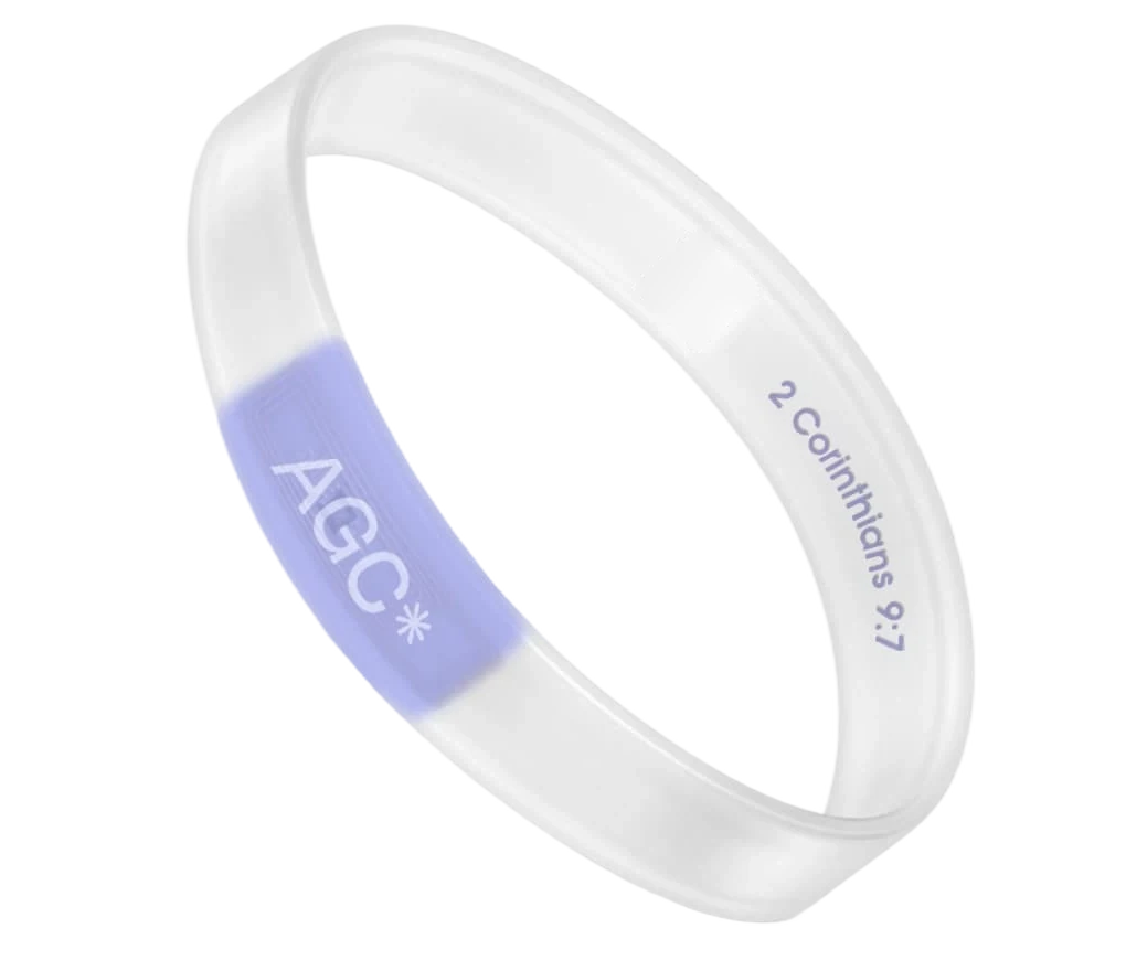 The AGC band: frosted silicone with a periwinkle panel reading A G C, and the reference 2 Corinthians 9:7.